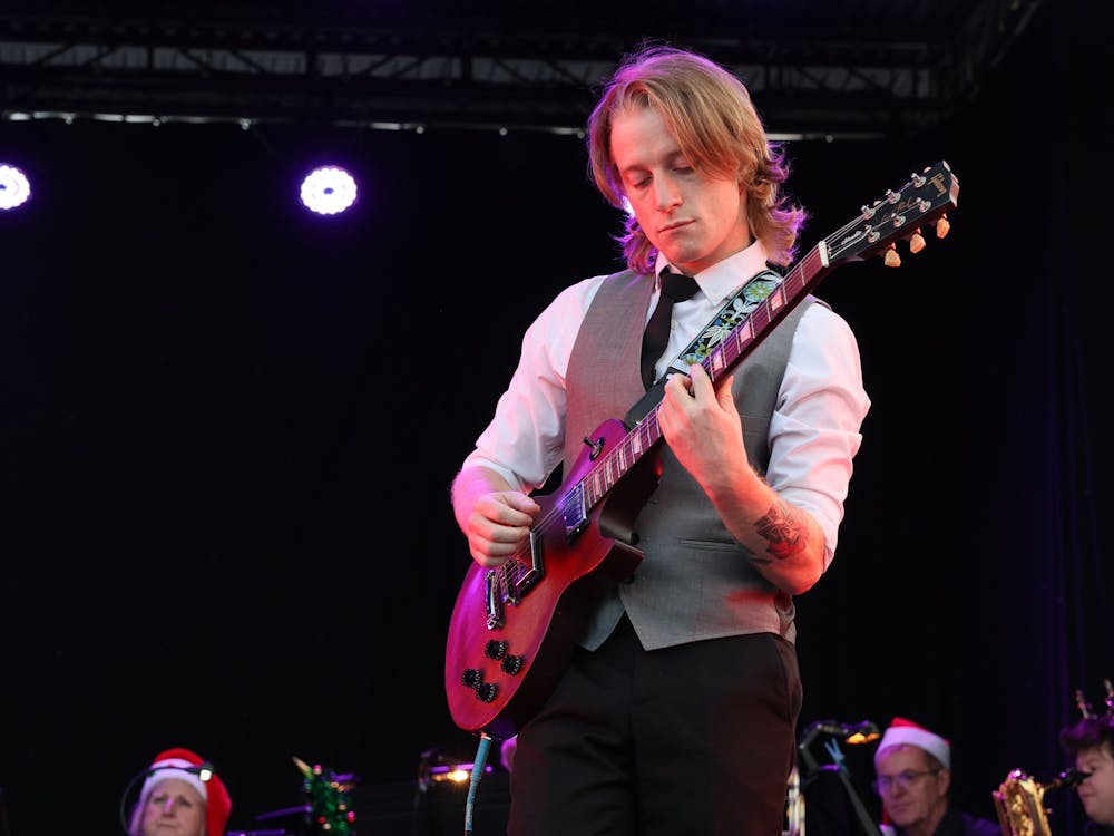Liam Kelly, guitar, Carols by Candlelight
