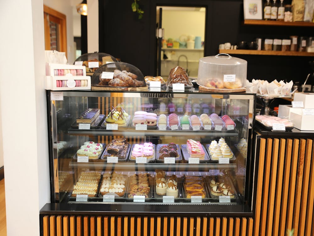 cakes on display at a counter