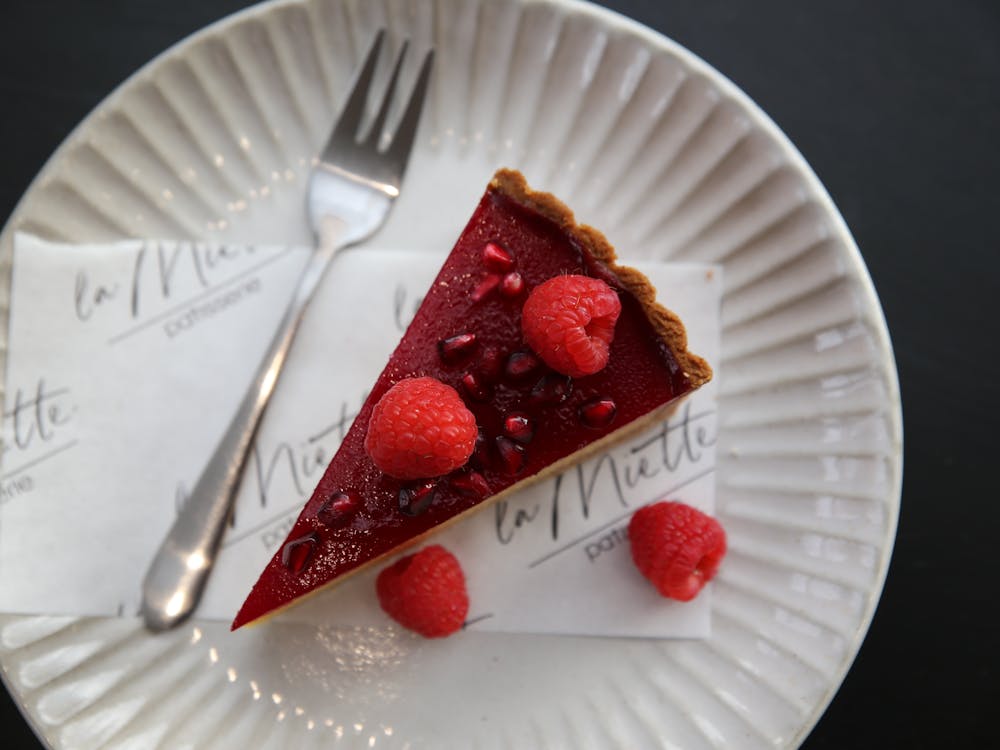 Seasonal pomegranate cream cheese custard tart slice