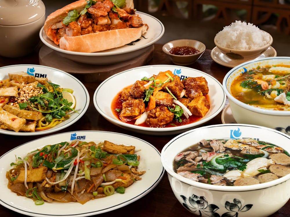 Bami Vietnamese Ballarat menu spread showing a fresh banh mi roll, pho broth bowl, and more