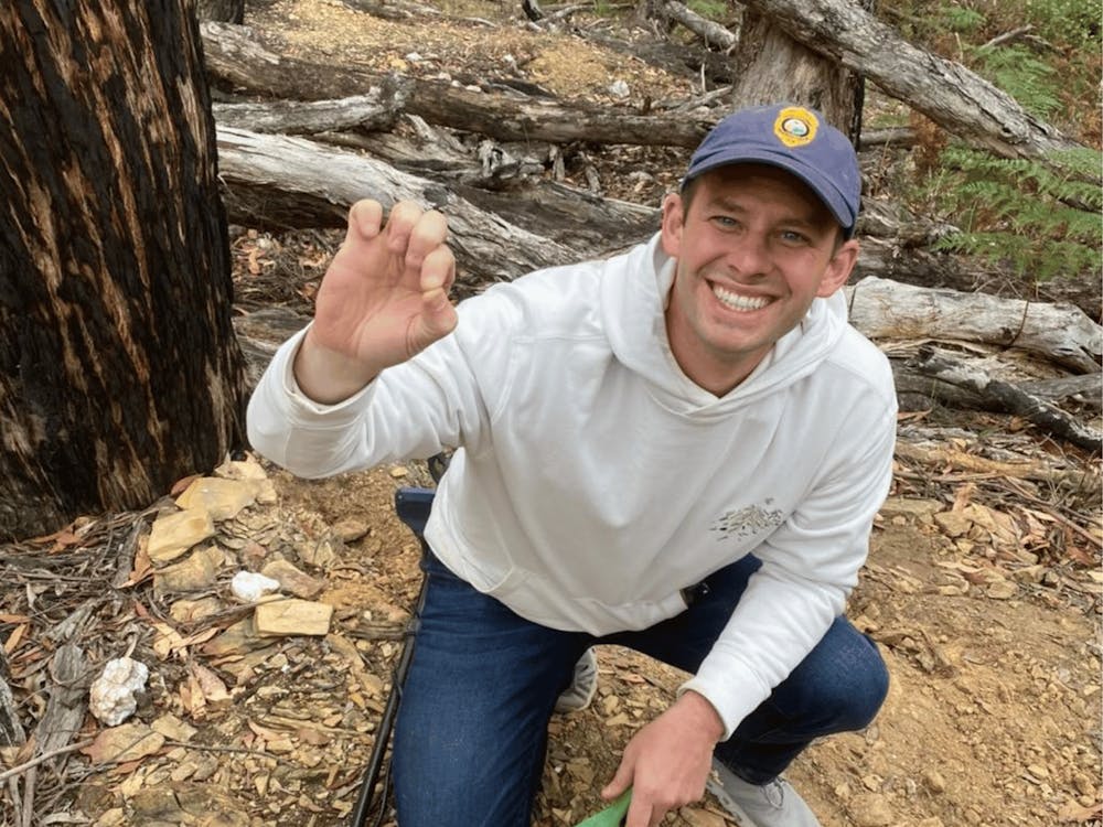 Participant holding a gold nugget discovered while exploring Victoria's goldfields.