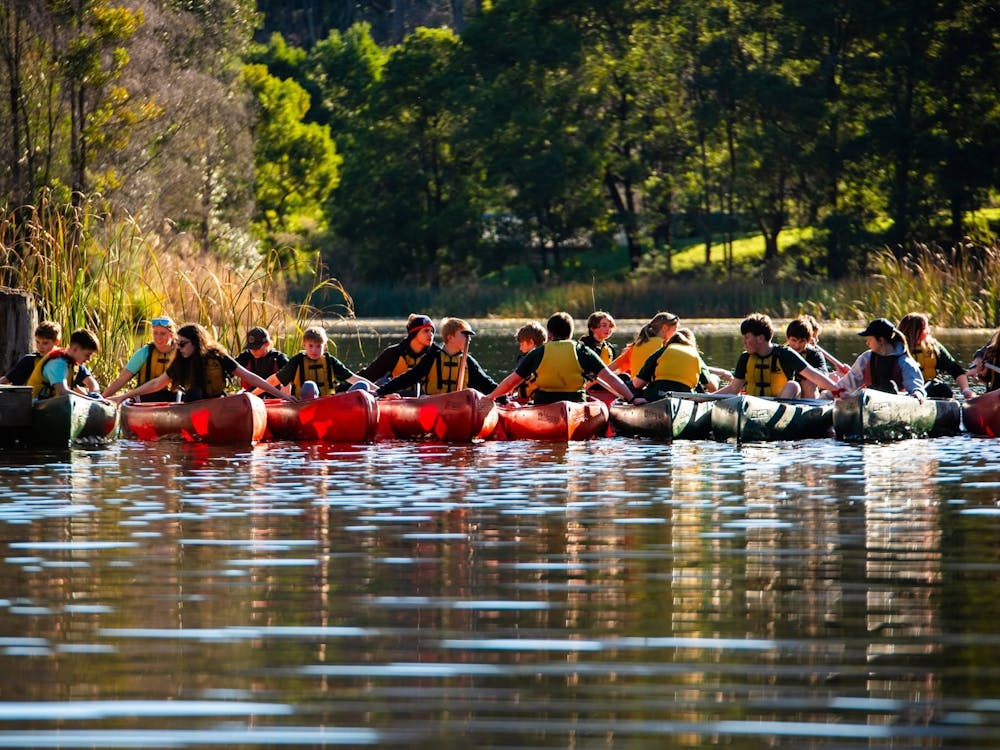 Campers enjoying time in the canoes