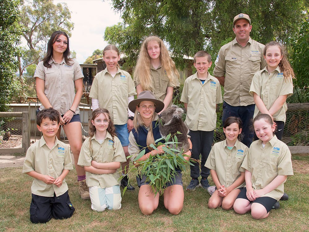 Group of children as zoo keepers
