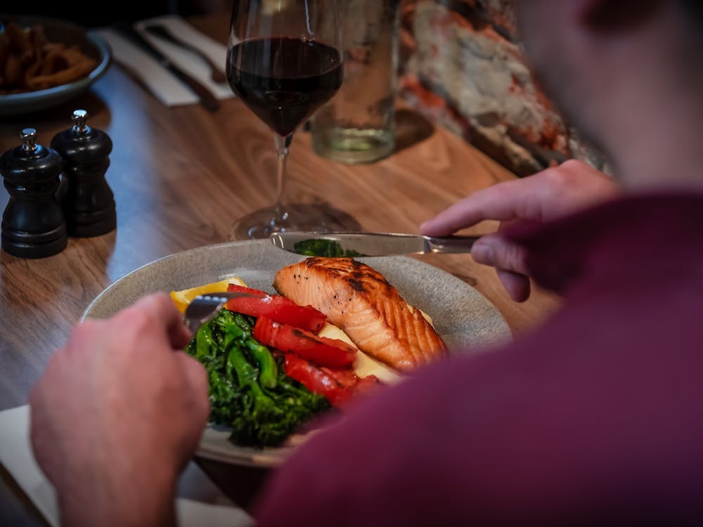 Guest enjoying a meal inside The North Star Hotel restaurant.