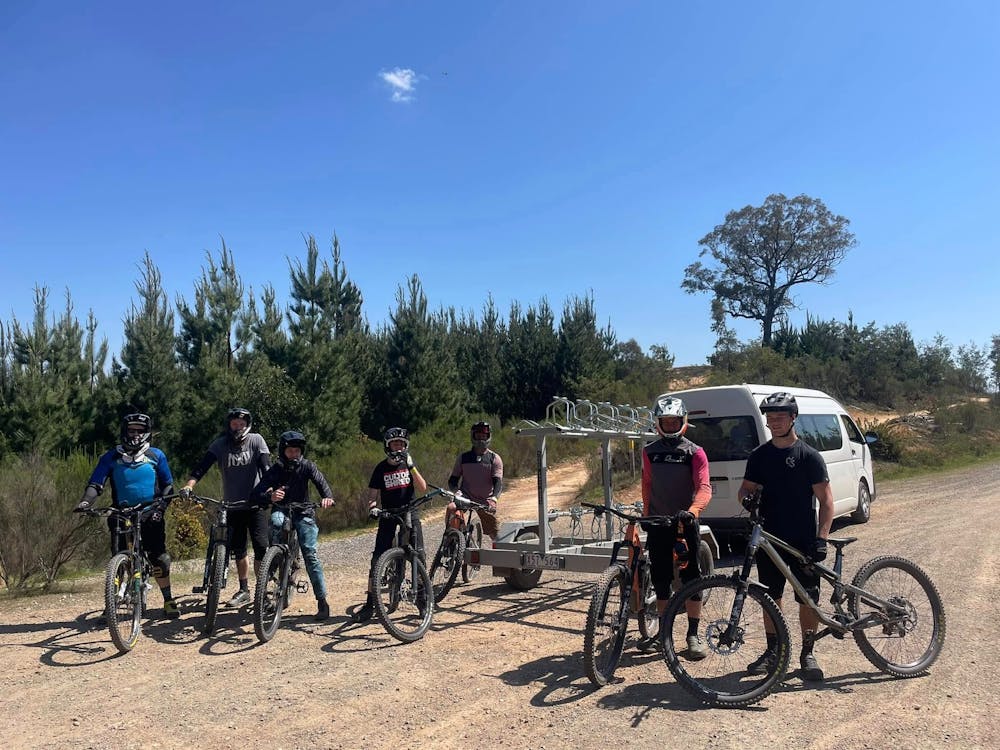 Group of riders in Creswick at the shuttle drop