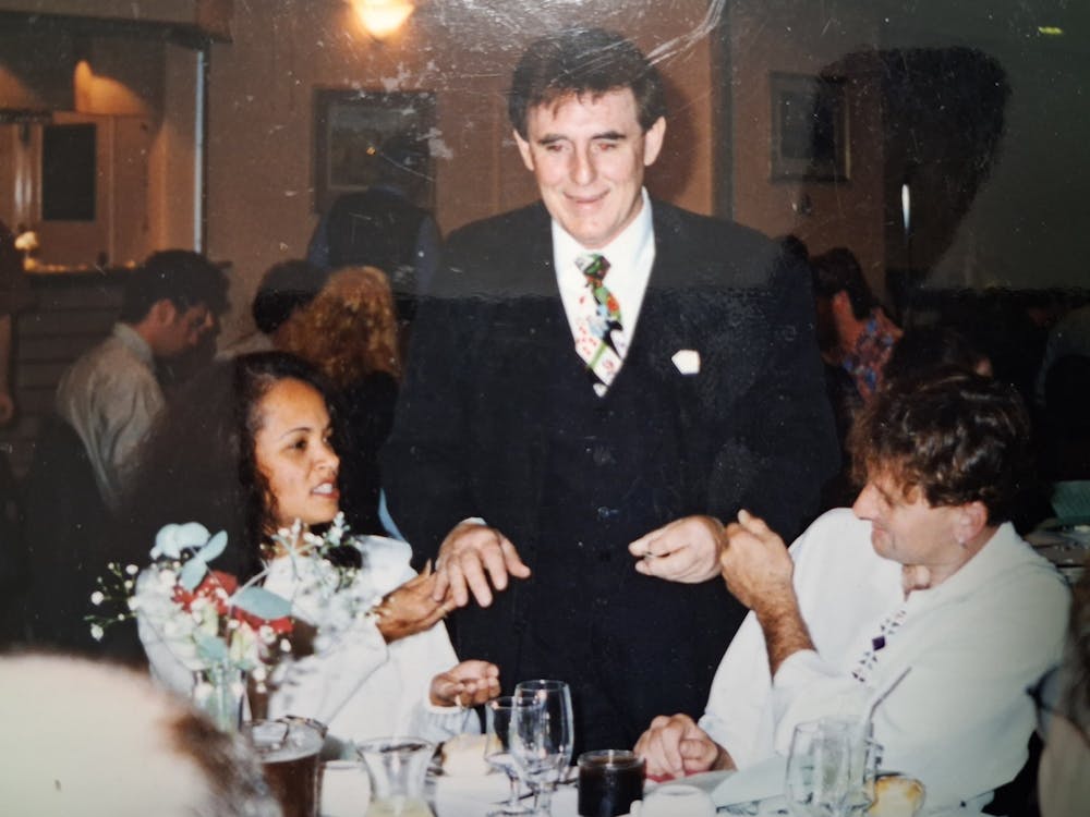 vintage images of Barry performing slight of hand at the dinnner table