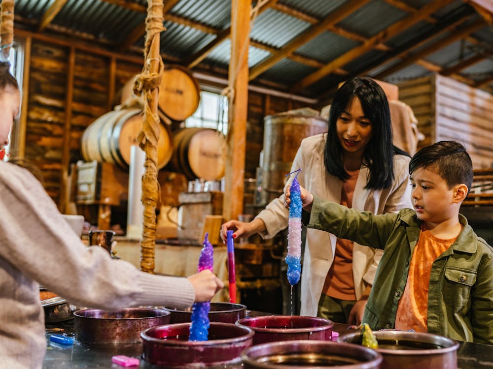 Mum and daughter candle dipping