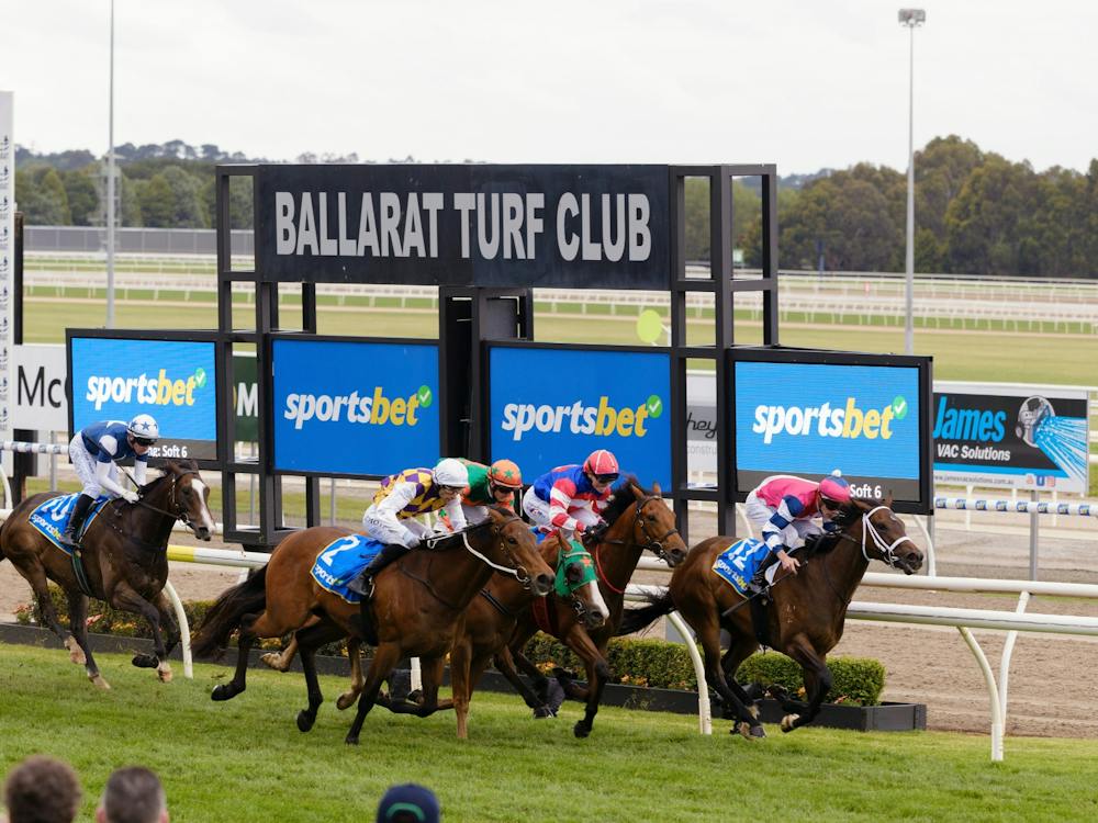 Horses going past the winning post.