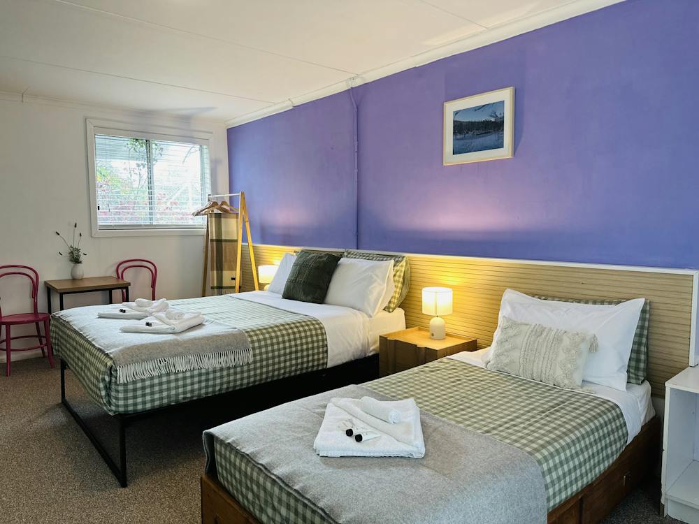 Family room with queen bed and single bed at Stonez Boutique Accommodation