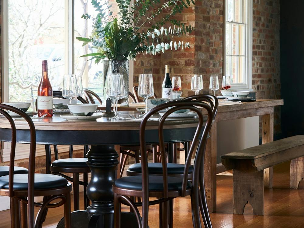 Cosy dining with wine looking out over the garden