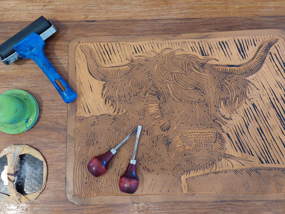 This iamge shows the lino cut tools uded to create Colin's prints