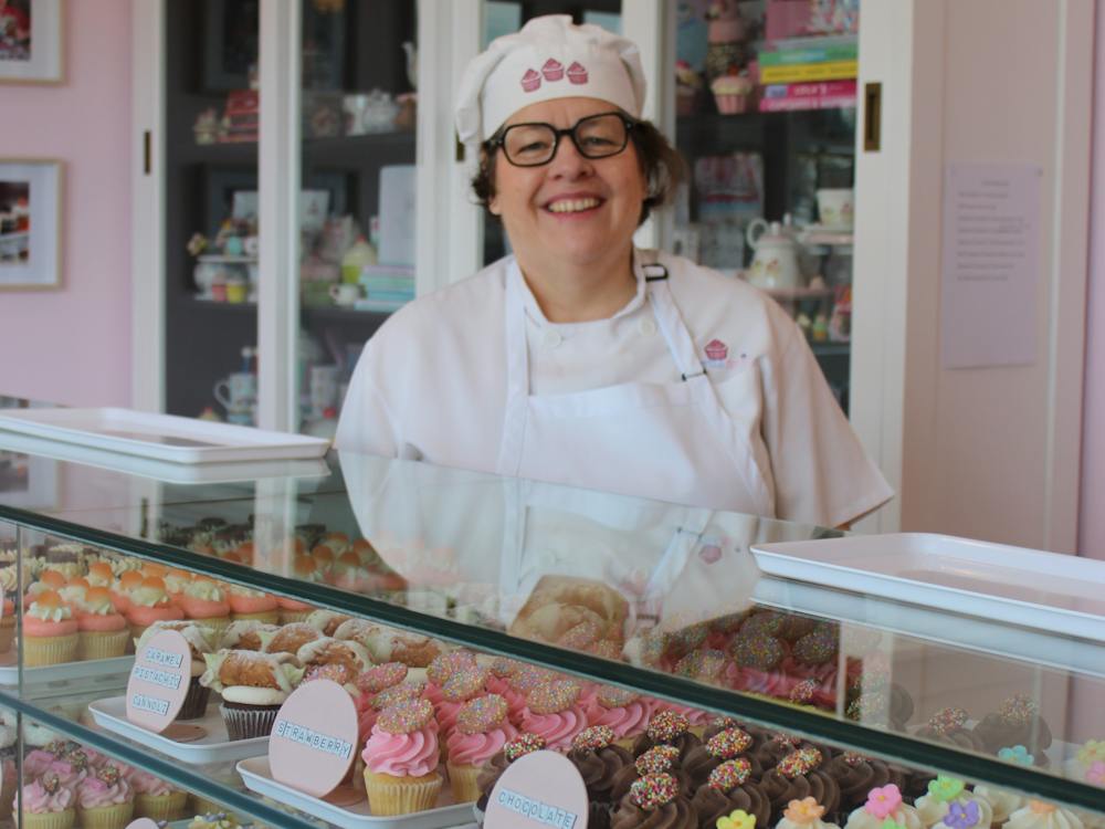 Owner behind the counter